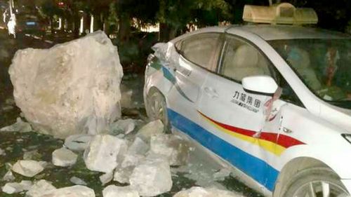 A damaged car after an earthquake in Jiuzhaigou County of southwest China's Sichuan Province. (AFP)