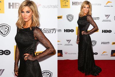 Delta Goodrem danced her way down the red carpet in a smouldering Johanna Johnson gown and some statement jewels. <br/>