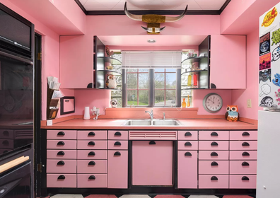 Even the kitchen cabinetry of the home is pink.
