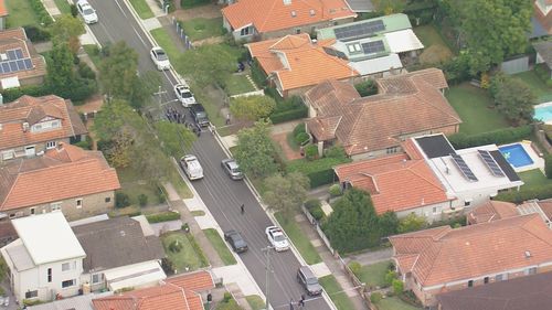 A man has died after a police shooting in Sydney's lower north shore.