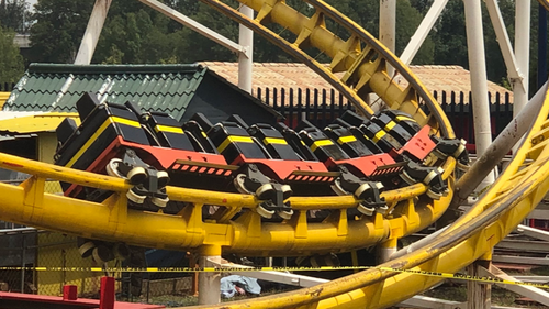 One of the coaster's carriages came off the tracks. 