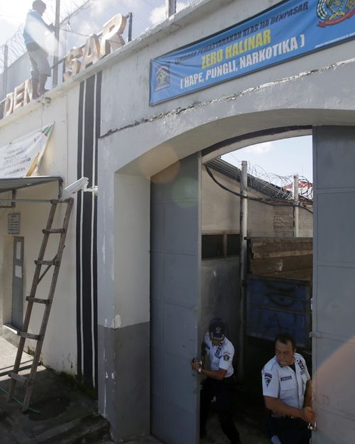 Guards open the main gates at Kerobokan jail, otherwise known as Hotel K