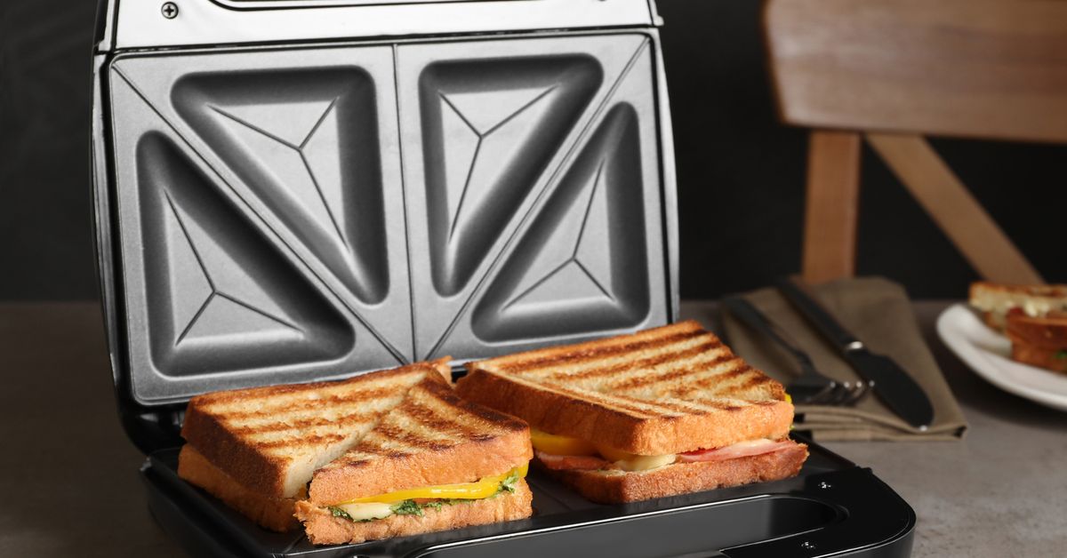 Baking paper hack lets you make a toastie without leaving burnt cheese on your sandwich press