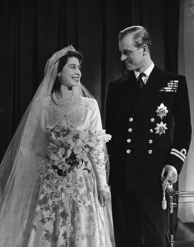 Princess Elizabeth, later Queen Elizabeth II with her husband Phillip, Duke of Edinburgh, on their wedding day, 20th November 1947. (Photo by © Hulton-Deutsch Collection/CORBIS/Corbis via Getty Images)