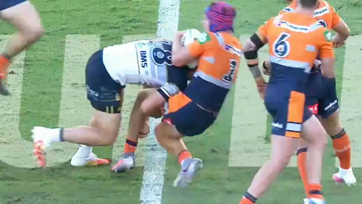 Ponga cops a big hit from the Cowboys