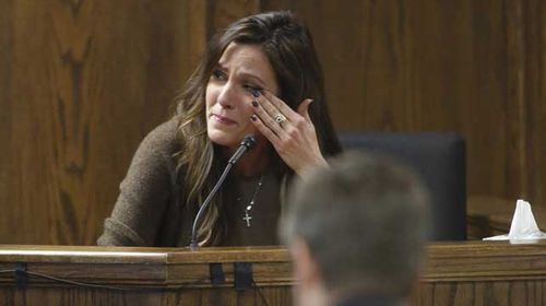 Taya Kyle, wife of slain Navy SEAL Chris Kyle, cries on the witness stand during the opening day. (Getty)