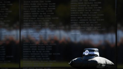 A Sydney driver has been charged for allegedly driving while drunk towards a police officer during a Remembrance Day ceremony.