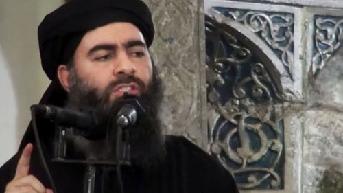 This image made from video posted on a militant website July 5, 2014, purports to show the leader of the Islamic State group, Abu Bakr al-Baghdadi, delivering a sermon at a mosque in Iraq during his first public appearance.