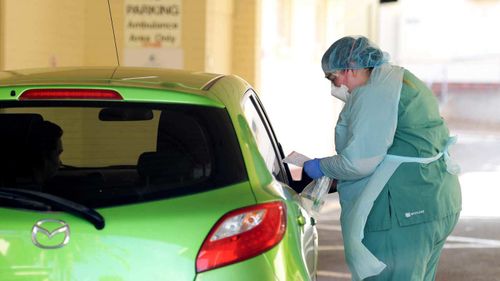 Health staff conduct tests at the COVID-19 testing centre in the Reactivating the Repat Hospital on March 11, 2020 in Adelaide, Australia.