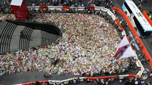 Floral tributes in Martin Place in Sydney. (AAP)