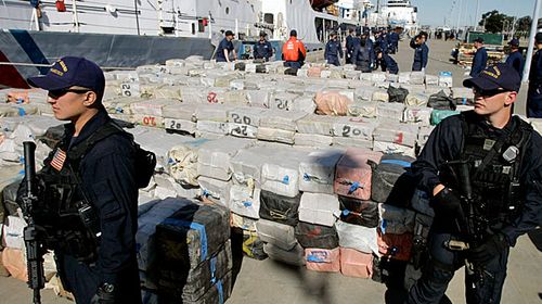 US Coast Guard officers watch over a cocaine shipment seized off Panama recently. (Photo: AP).