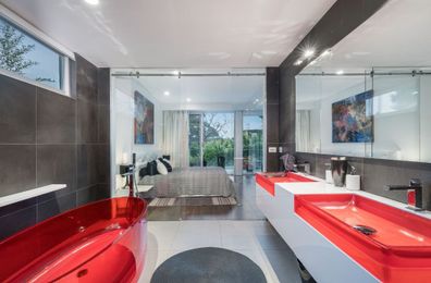 Wild detail bathroom Melbourne home for sale red bathtub Victoria Domain 