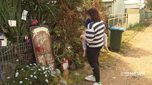 Relatives lay tributes for the murdered grandmother.