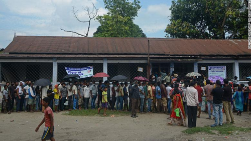 People queue for the Covishield vaccine in Siliguri, West Bengal, on October 1. 
