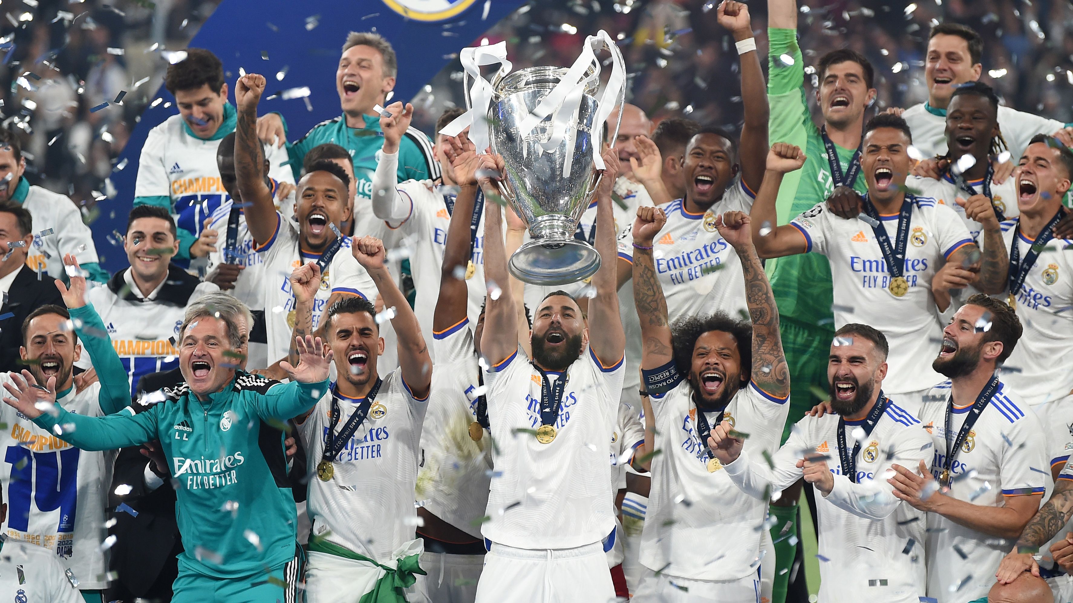 Karim Benzema of Real Madrid lifts UEFA Champions League Trophy following his team&#x27;s victory.