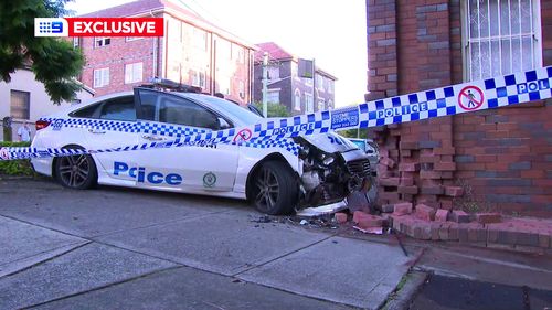 NSW Police crash into building while responding to fatal accident.