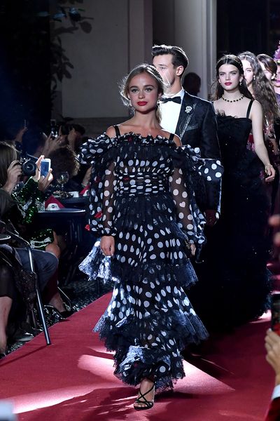 Amelia Windsor walks the runway at the Dolce &amp; Gabbana secret show during Milan Fashion Week Spring/Summer 2018.