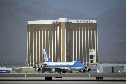 Air Force One touches down in Las Vegas in front of Mandalay Bay where the shooting occurred. (AP)