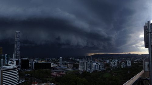 The storm pictured rolling in from the roof of the Hotel Grand Chancellor on Leichhardt Street, Brisbane. (Shane Faulkner)