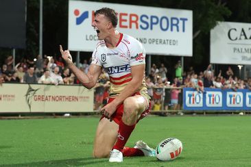 Jack Bostock of the Dolphins celebrates after scoring a try against the Eels.