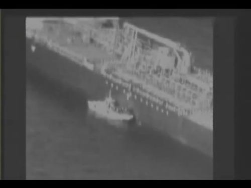 According to the US Navy, the video allegedly shows an Iranian Gashti Class patrol boat's crew 'removing an unexploded limpet mine' from the Kokuka Courageous tanker. 