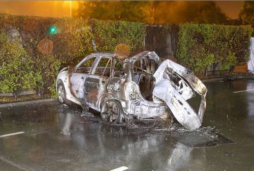 The stolen car the three teens were in, burst into flames when it crashed after hitting police road spikes.