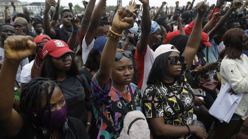 People demonstrate on the street to protest against police brutality in Lagos, Nigeria.
