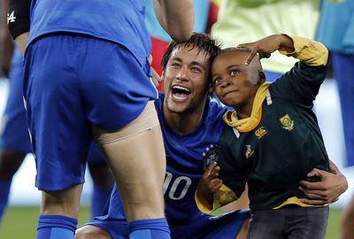 <p>Pitch invasions don't normally end well, but this one is sure to make you smile.</p><br/><p>A young soccer fan somehow made his way onto the field during Brazil's match against South Africa at Soccer City stadium in Soweto on Wednesday.</p><br/><p>Security guards made a B line for the youngster, but Brazilian superstar Neymar intervened, grabbing the boy to introduce to the rest of the team and pose for photos.</p><br/><p>Scroll through for some pitch invasions that didn't end so well.</p>