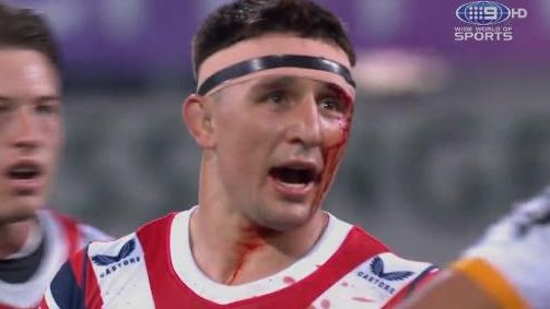 Roosters star Victor Radley argues with the referee after being asked to have his blood cleaned up.