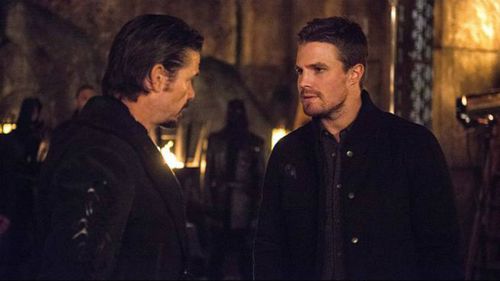 Ra's Al Ghul (Nable) faces off against Oliver Queen (Amell). (CW)