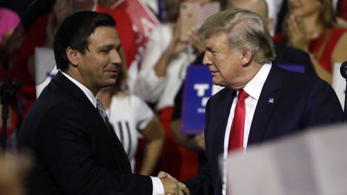 Ron DeSantis at a rally with Donald Trump.