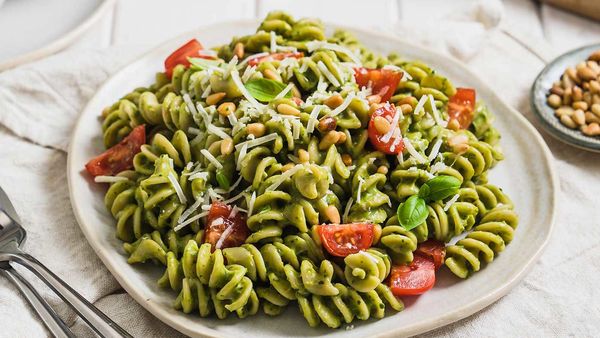 Avocado pesto pasta with cherry tomatoes