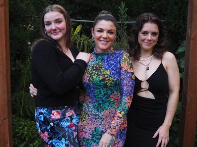 Em Rusciano poses with her daughters Odette (left) and Marchella (right).