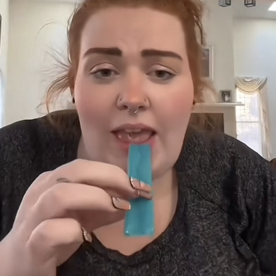 The woman appeared to eat a Fruit Roll-Up straight from the fridge which lead viewers to think she also consumed the plastic wrap.