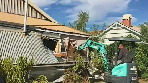 Malcolm, 57, and Garry, 59, filmed themselves demolishing the property meant to go to auction the next day with a hired excavator.
