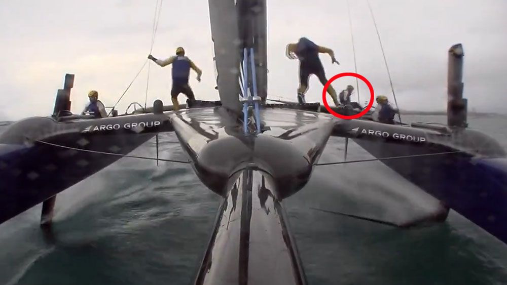 Sweden's Australian skipper Nathan Outteridge goes overboard in America's Cup