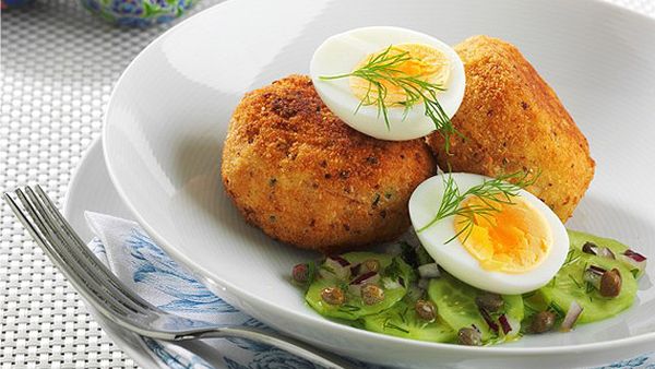Smoked trout patties with soft boiled egg and cucumber, dill and caper salad