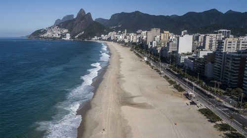 A normally packed Ipanema Beach in Rio de Janeiro lies empty.