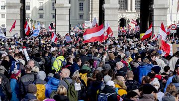 People take part in a demonstration against the country&#x27;s coronavirus restrictions in Vienna, Austria