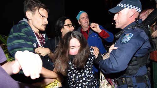 Protesters chanted anti-racism slogans outside Pauline Hanson's Senate launch. (AAP)