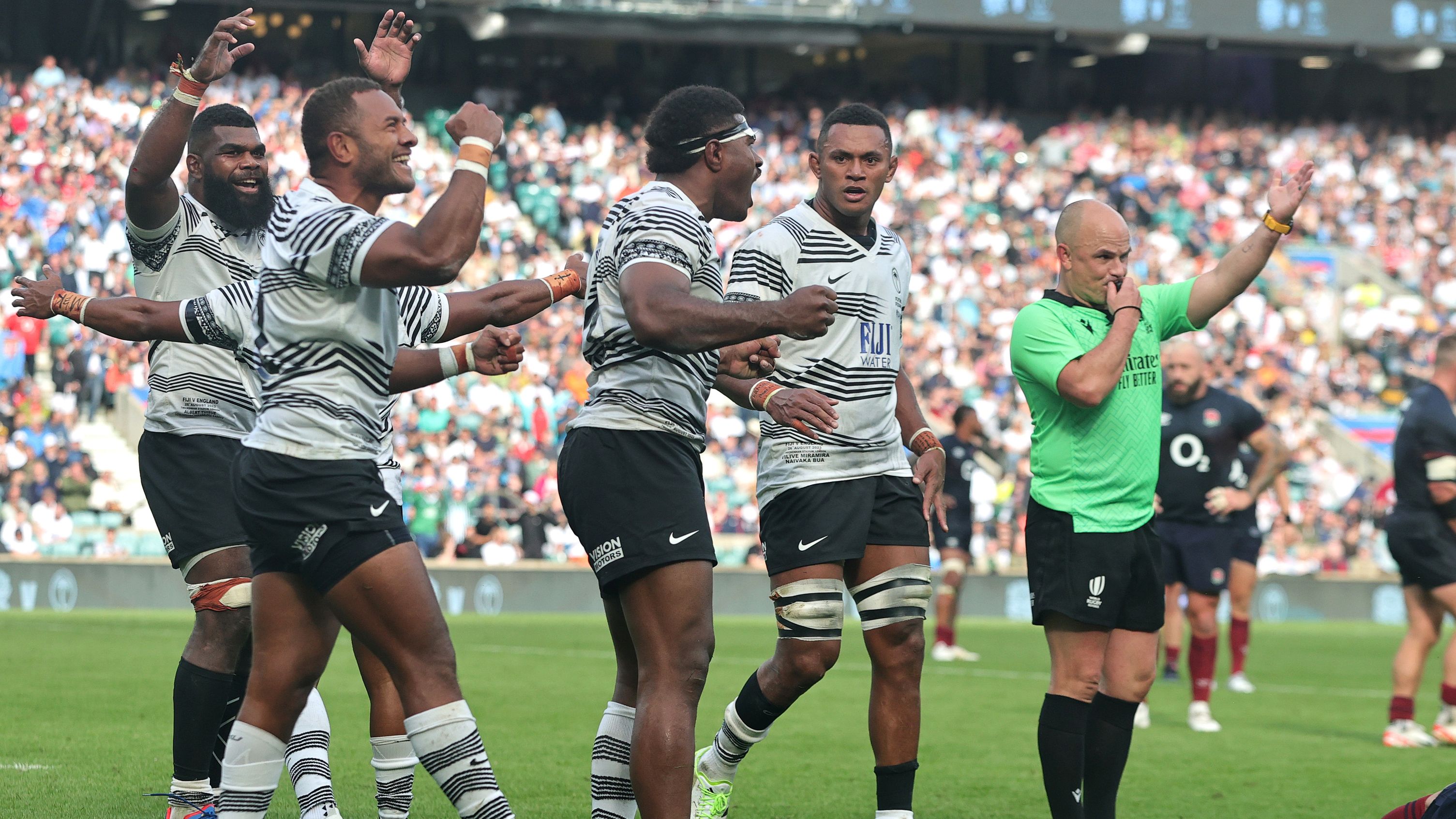 Fiji celebrate their historic victory over England.