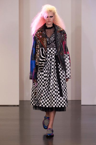 For Resort 2017, Marc Jacobs isn't taking you to an exotic
location, instead you'll be time-travelling back to the '80s. With teased,
crimped hair, glossy lips and high-octane eye-shadow, models hit the runway decked
out in the decade's signatures – zebra stripes, exaggerated puff sleeves and MTV motifs.
This is one collection set to make its way to your Instagram feed.&nbsp;