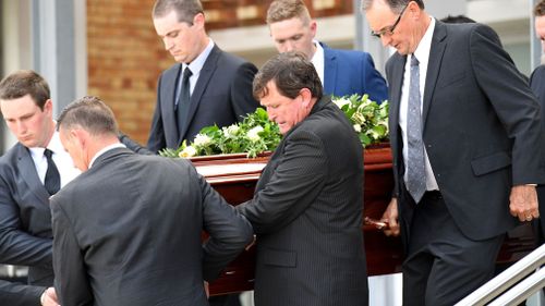 The coffin is seen at the State Funeral for Lady Florence Bjelke-Petersen at Kingaroy Town Hall. (AAP)