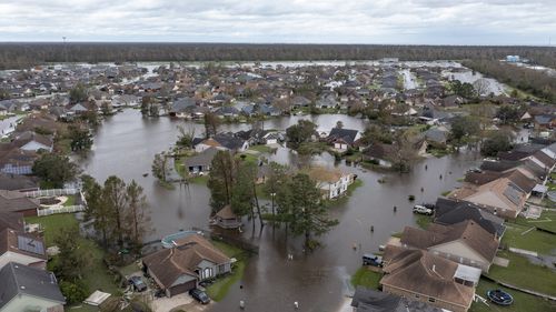 Flooded streets and homes are shown in the Spring Meadow subdivision in LaPlace, Louisiana after Hurricane Ida.