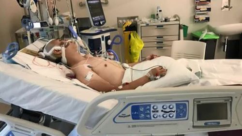 New dad fighting for life after violent Melbourne carjacking