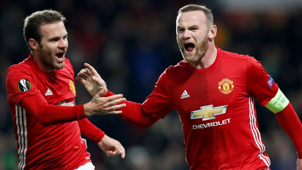 Rooney claims record, hits out at UK media