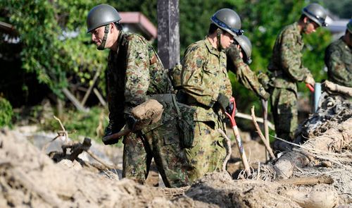 The Japanese military have been called in to the disaster areas. (AP).