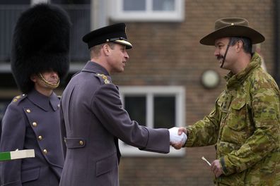 Prince William meets troops from the 5th Royal Australian Regiment at a St David's Day parade with members of the 1st Battalion, The Welsh Guards in Windsor England, Wednesday, March 1, 2023.