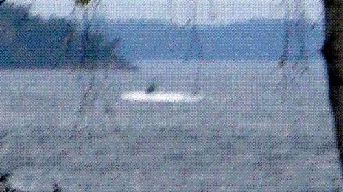 A close-up of the vessel, suspected of being a Russian submarine.