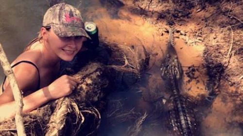 Queensland woman takes selfie with crocodile